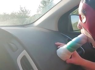 Sexy girl masturbates while in a car